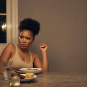 Confused Look At Dinner Table